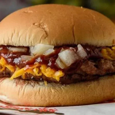 BBQ Burger - Juicy burger with BBQ sauce and onions