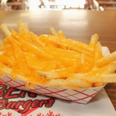Cheese Fries - Crispy fries topped with melted cheese