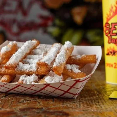 Funnel Cake Fries - Sweet funnel cake fries with powdered sugar